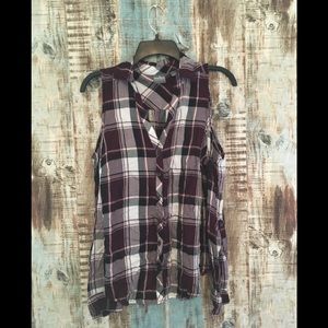 Long sleeved blouse with cut out shoulders